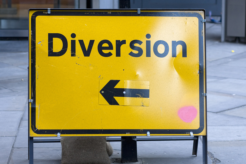 Construction sign that says "Diversion" suggesting that the road is under construction.