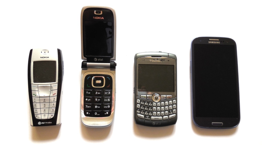 Four generations of cell phones