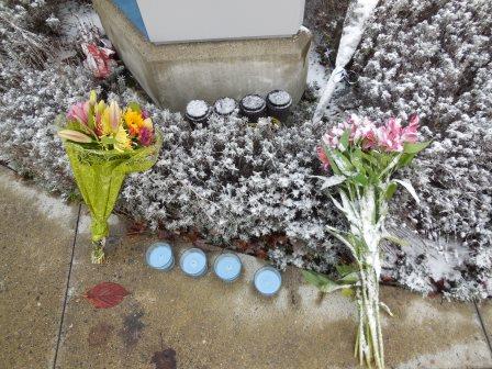 Four Coffee Cups and Candles at the Memorial to Four Lakewood Police officers outside Blue Steele Coffee in Parkland, WA