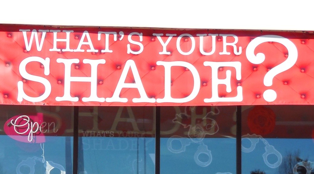 "What's Your Shade" banner at Lovers store