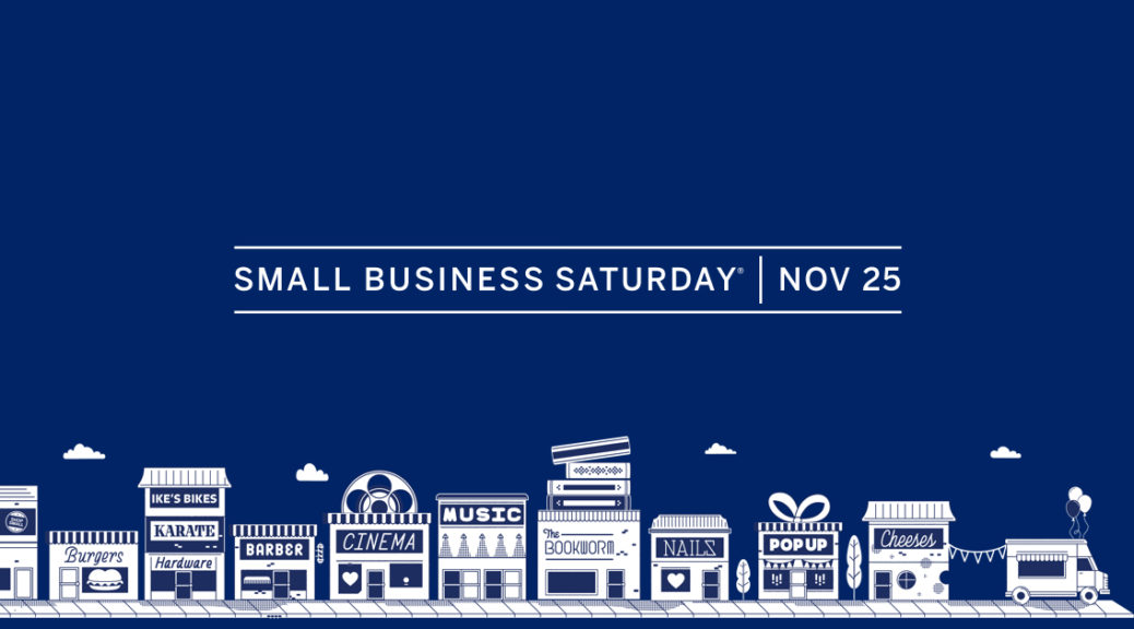 Small Business Saturday image with shops against a blue background, image courtesy of American Express https://icm.aexp-static.com/shopamex/ShopsmallRelease1/application/public/img/nc-images/small_business_saturday_FB_share.jpeg