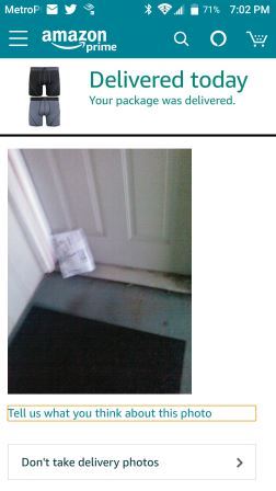 Screen shot of the Amazon app showing a package in front of the doorstep where it was just delivered.
